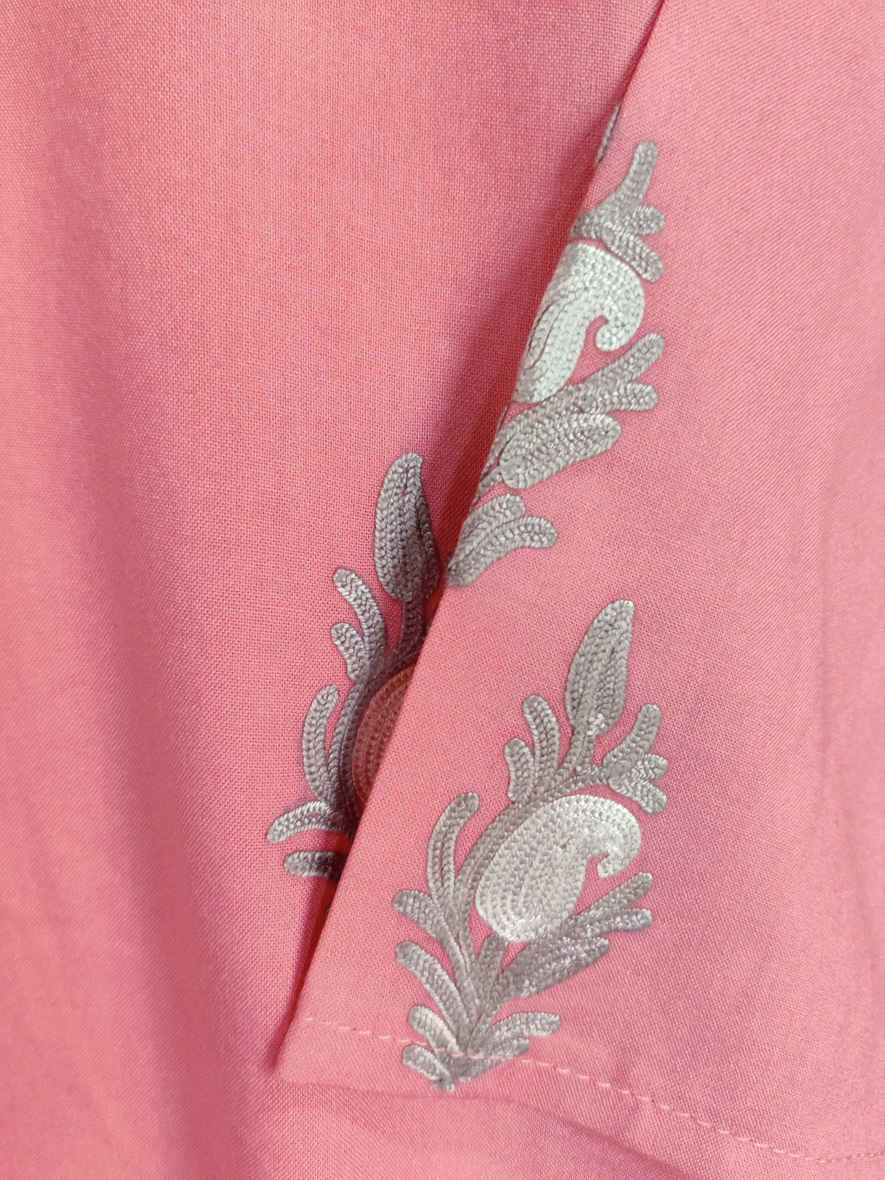 Graceful Pink Aari Embroidered Kurti